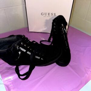 Brand new! 
Black suede guess shoes